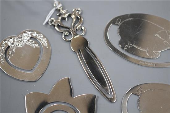 Six assorted modern silver bookmarks, of varying designs, including a pair of oval, engraved with a pig and an Italian ornate dagger.